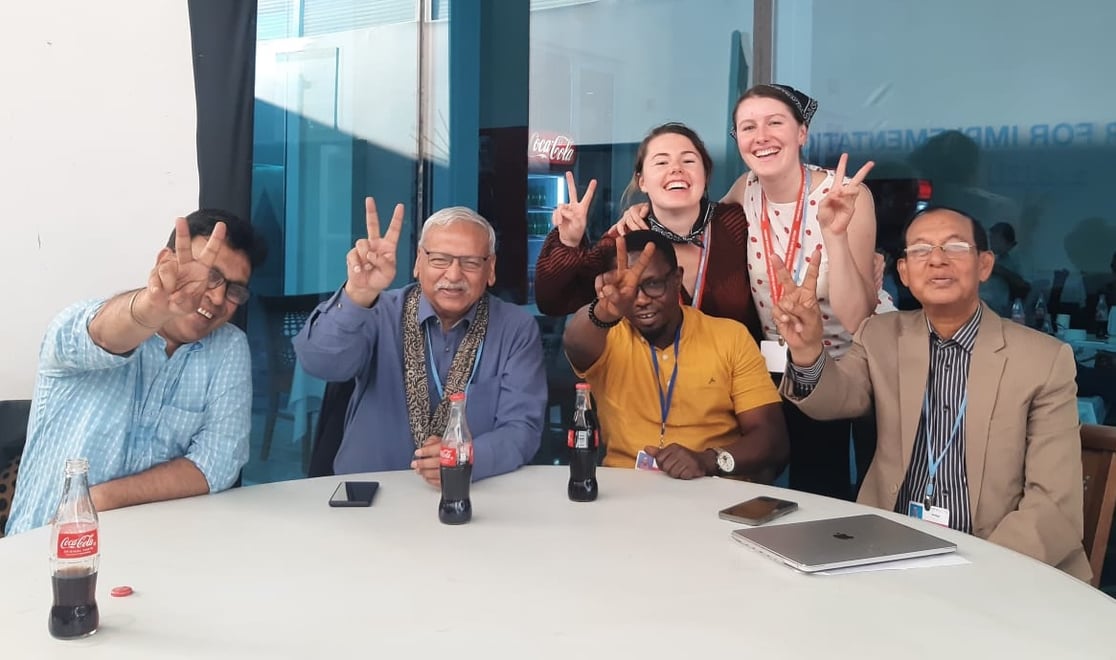 Saleemul Huq & colleagues celebrating the passage of the Loss and Damage Fund, COP27